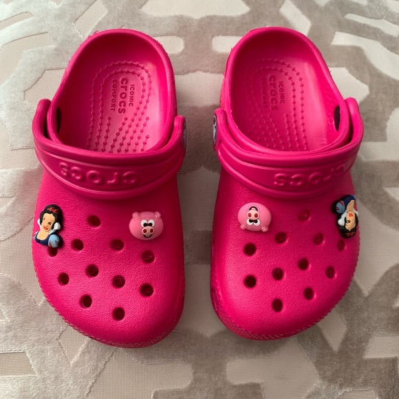 pink crocs with charms